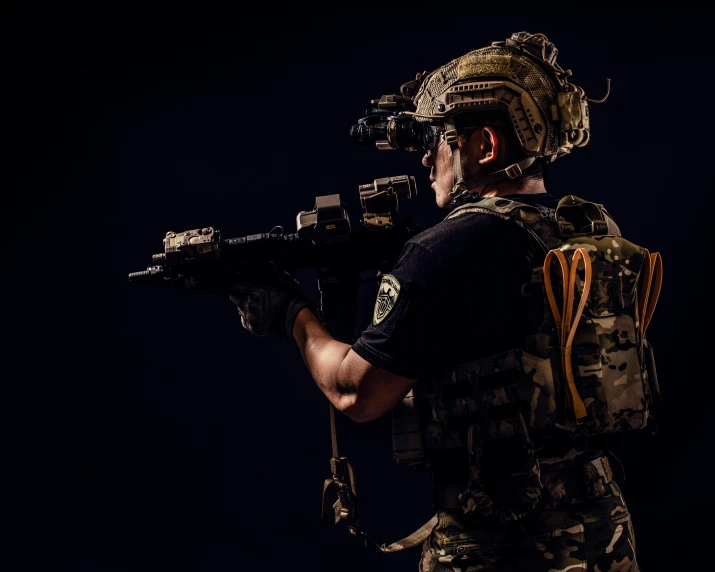 a soldier with a gun in his hand, a portrait, by Adam Marczyński, shutterstock, dressed in tactical armor, foam, low key, instagram post