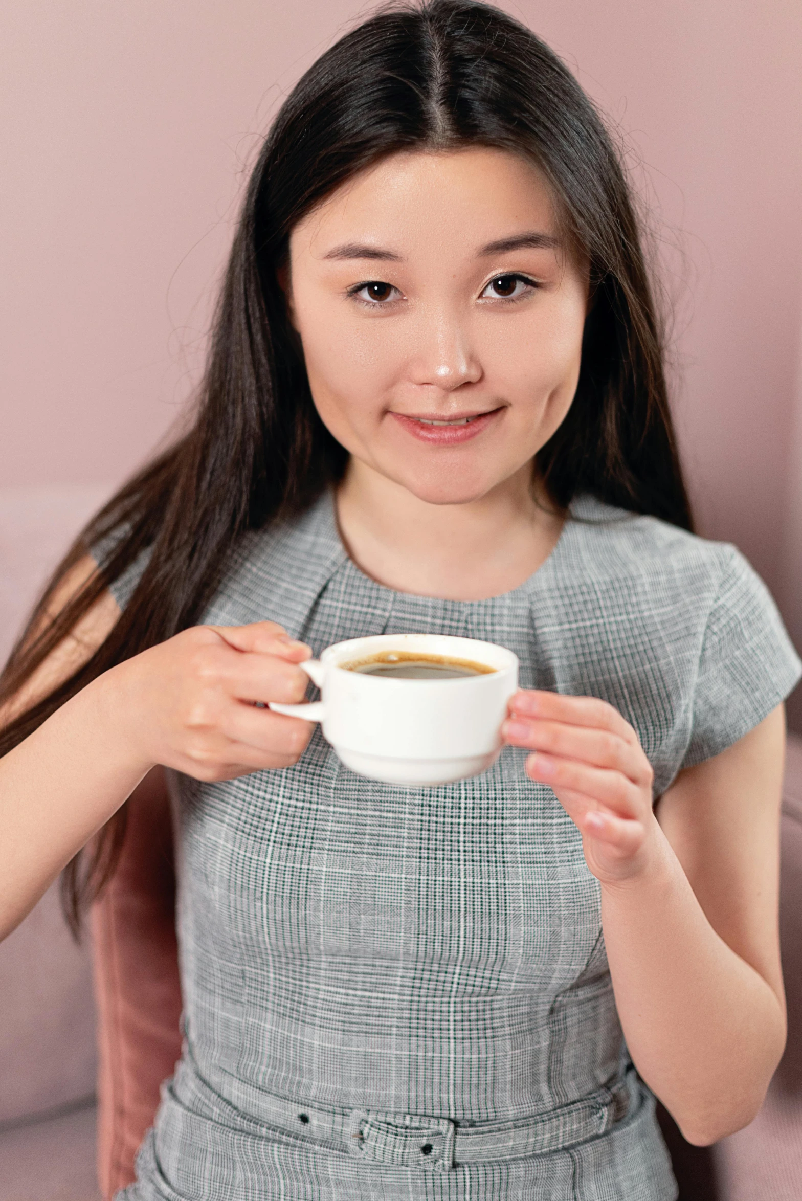 a young girl holding a cup of coffee, inspired by helen huang, pexels contest winner, renaissance, wearing business casual dress, portrait of a japanese teen, high resolution product photo, small chin