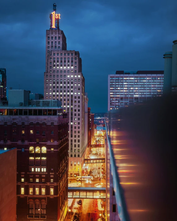 a view of a city at night from the top of a building, in style of joel meyerowitz, modernist buildings, louis sullivan, slide show