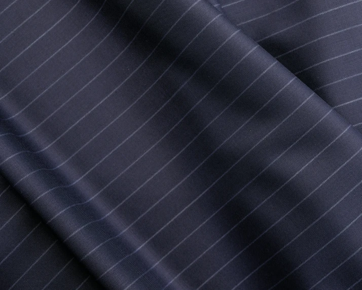 a close up of a suit on a mannequin mannequin mannequin mannequin mannequin mannequin manne, inspired by Tsuji Kakō, unsplash, wearing a pinstripe suit, 8k fabric texture details, square lines, midnight blue