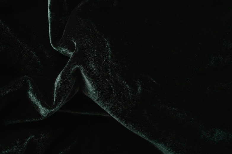 a close up of a black velvet fabric, aurora green, thumbnail, westside, platinum