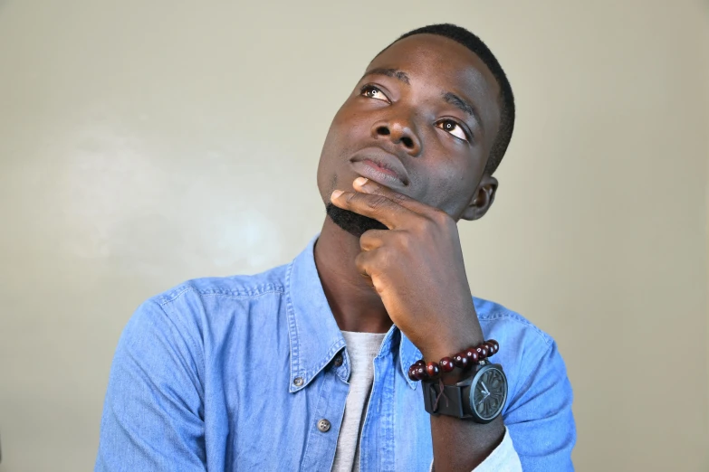 a close up of a person wearing a watch, by Stokely Webster, pexels contest winner, realism, black teenage boy, thinking pose, a handsome, adut akech