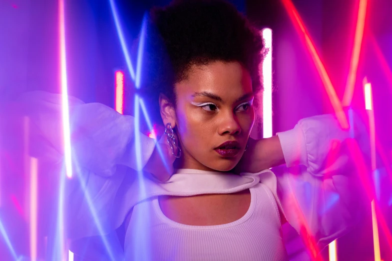 a woman standing in front of neon lights, pexels contest winner, afrofuturism, tessa thompson inspired, fashion studio lighting, studio lighting”, bisexual lighting