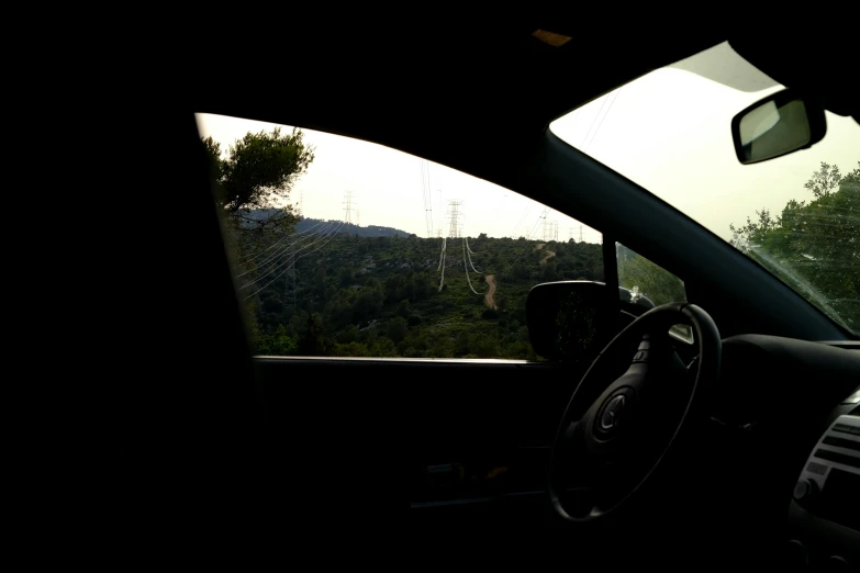 a view of the mountains from inside a car, by Alexis Grimou, pylons, meni chatzipanagiotou, distant full body view, silhouette :7