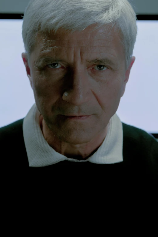 a close up of a person wearing a sweater, a hologram, inspired by René Auberjonois, still from breaking bad, bill murray, integrated synthetic android, serious business