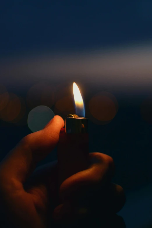 a person holding a lighter in their hand, pexels contest winner, romanticism, candlelit, instagram post, profile image, blue flame