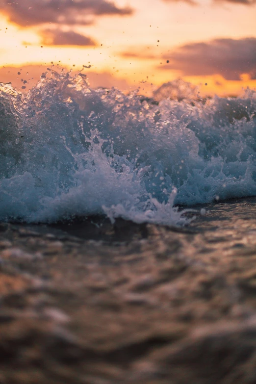 a man riding a wave on top of a surfboard, unsplash, renaissance, evening at dusk, water splashes, washed up, in a sea