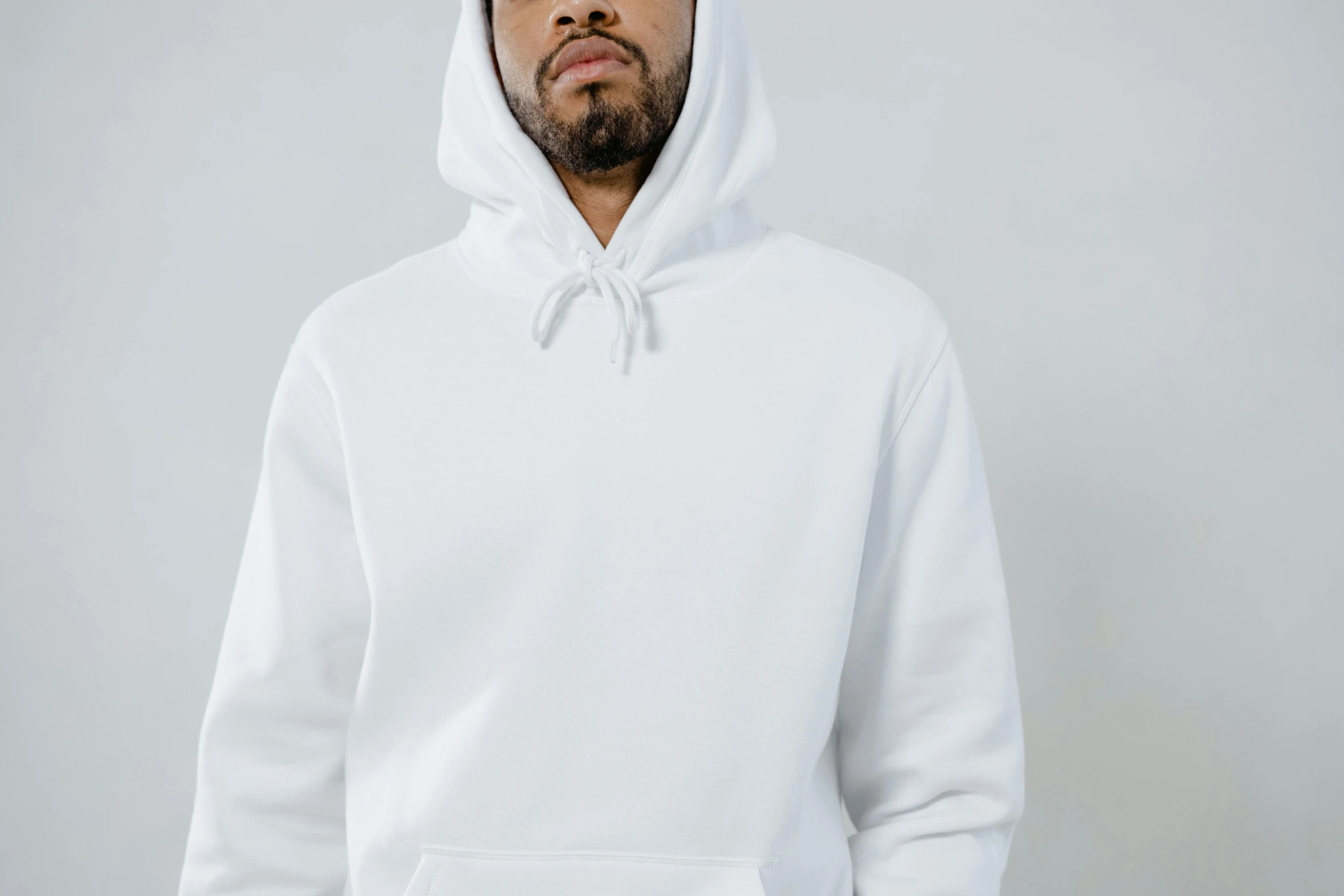 a man with a beard wearing a white hoodie, oversized hoodie, background image, full product shot, a middle-shot from front