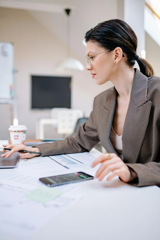 a couple of people that are sitting at a table, woman in business suit, profile image, engineering, thumbnail