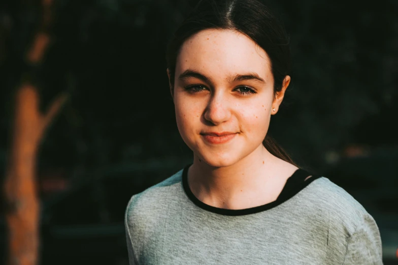 a close up of a person wearing a shirt, pexels contest winner, portrait of white teenage girl, confident looking, avatar image