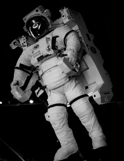 a black and white photo of an astronaut, unsplash, full body with costume, full body-n 9, extremely high contrast!, gary houston