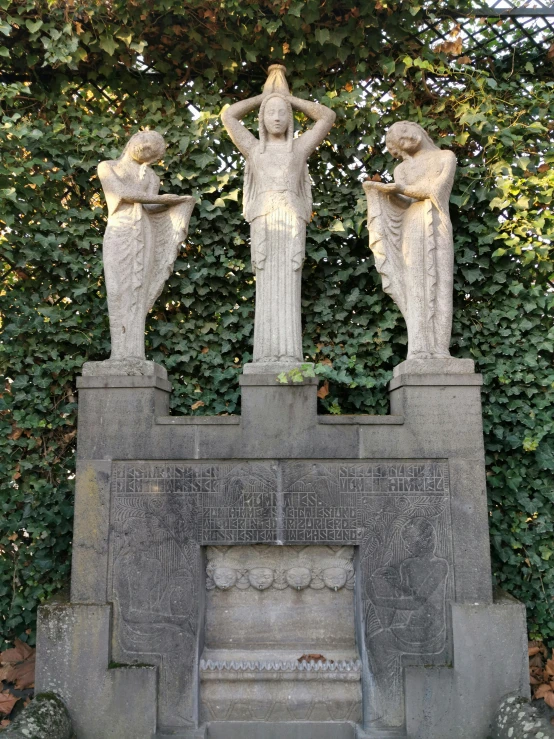 a couple of statues sitting on top of a stone fire place, inspired by Cornelis Engebrechtsz, 3 nymphs circling a fountain, tombstone, the empress’ hanging, taken in the early 2020s
