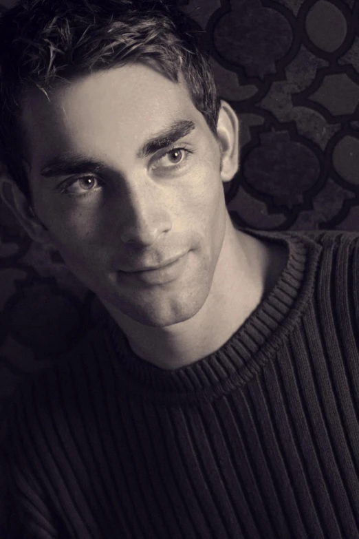 a black and white photo of a man in a sweater, inspired by Nicholas Marsicano, handsome male vampire, early 2 0 0 0 s, recital, promotional image