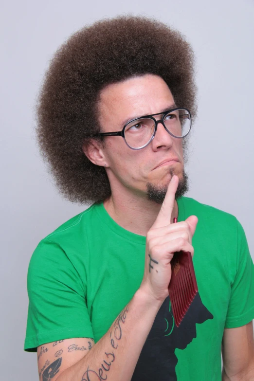 a man wearing a green shirt and a red tie, inspired by Jeffrey Smith, stuckism, long afro hair, thinking pose, doug walker, ultra high res