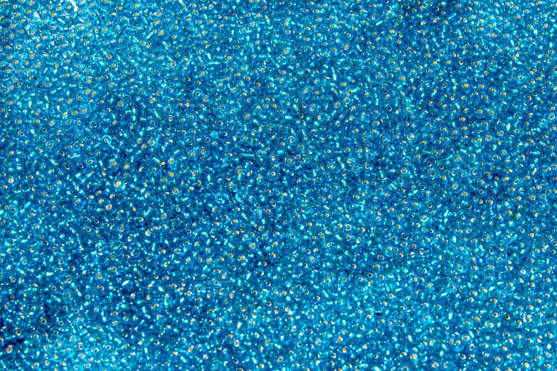 a close up of a blue glitter background, by Howardena Pindell, reddit, kinetic pointillism, 1024x1024, turquoise gold details, blue transparent jelly, hq 4k phone wallpaper