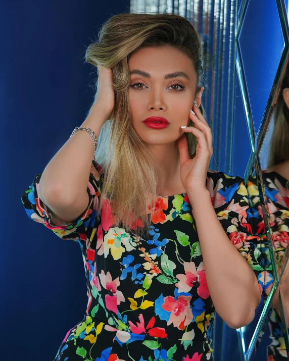 a woman standing in front of a mirror talking on a cell phone, an album cover, trending on pexels, toyism, miranda kerr, dressed in a flower dress, portrait mode photo, colorful]”