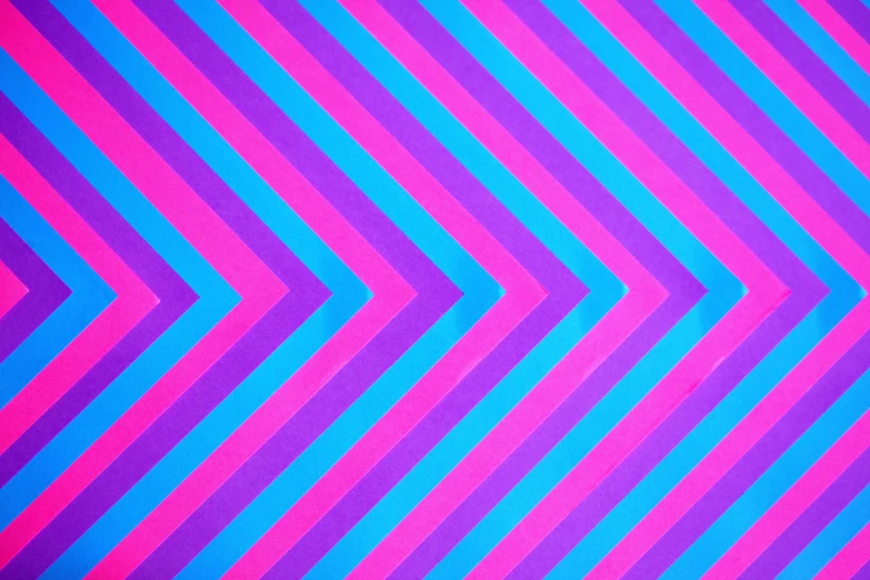 a pink and blue zigzag background, an album cover, pexels, background hyper detailed, arrows, complementary colours, paper background