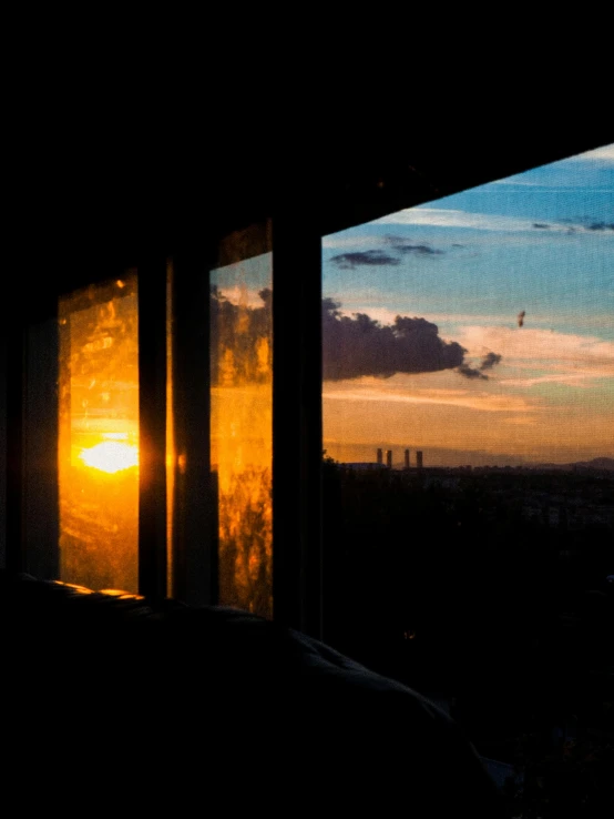 the sun is setting through the windows of a building, inspired by Elsa Bleda, unsplash contest winner, realism, sunset panorama, at home, today\'s featured photograph 4k, waking up