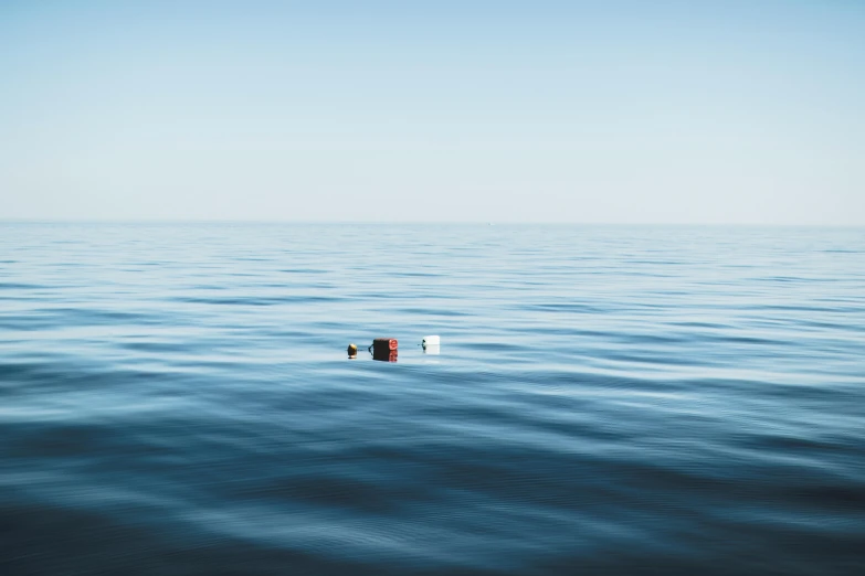 a bottle floating in the middle of the ocean, by Jesper Knudsen, minimalism, robotics, no text, dingy, alessio albi