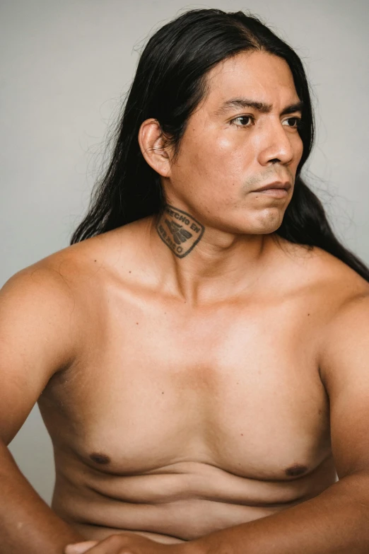 a man with a tattoo on his chest, a tattoo, inspired by Jorge Jacinto, inuit heritage, non binary model, shoulder long hair, breastplate