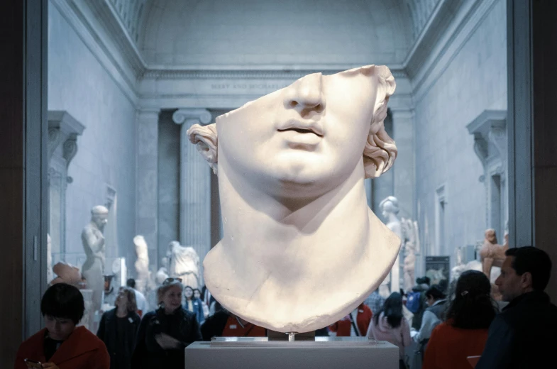 a group of people standing around a bust of a man, a marble sculpture, trending on unsplash, neoclassicism, jimin\'s grecian nose, visor over face, white marble interior photograph, head and chest only