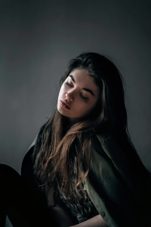 a woman sitting on the floor with her eyes closed, inspired by Elsa Bleda, trending on pexels, renaissance, young woman with long dark hair, pouty face, cynthwave, headshot