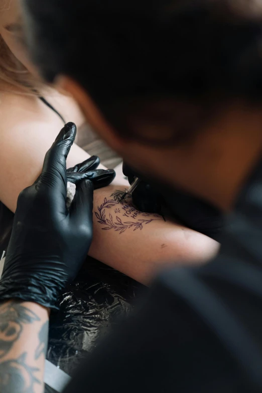 a man getting a tattoo on a woman's arm, trending on pexels, hyperrealism, synthetic bio skin, black, veins, ilustration