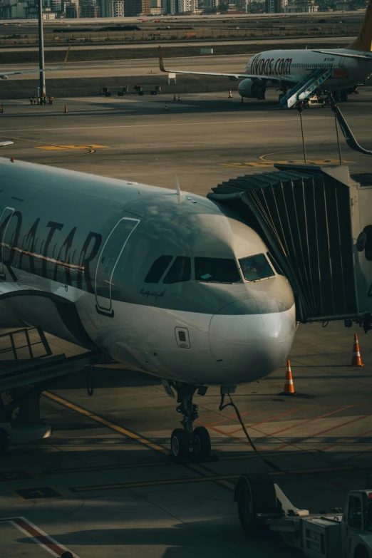 a large jetliner sitting on top of an airport tarmac, by Daniel Taylor, pexels contest winner, square, low detail, avatar image, hd footage