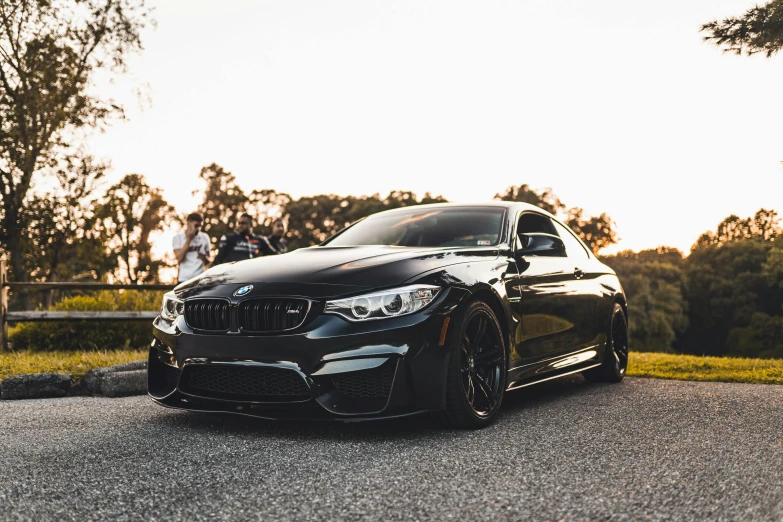 a black car parked on the side of the road, by Adam Rex, pexels contest winner, renaissance, bmw, avatar image, full view of a sport car, long front end