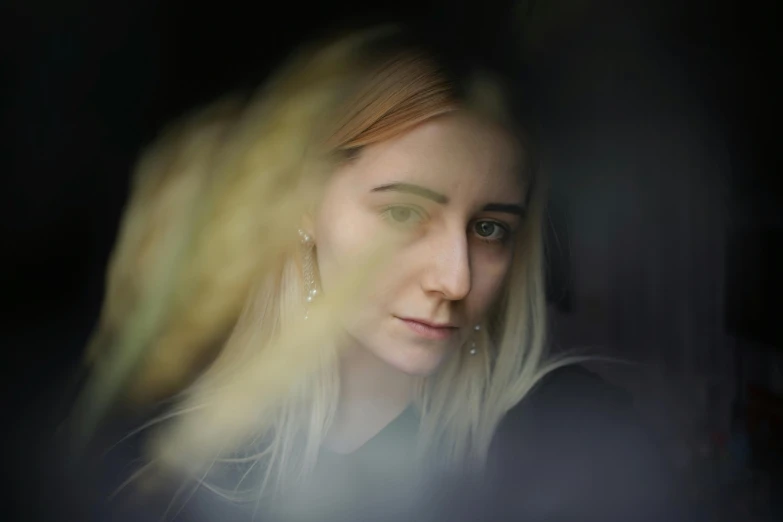 a close up of a person with a cell phone, a character portrait, inspired by Elsa Bleda, pexels contest winner, saoirse ronan, viewed through the cars window, ((portrait)), matte painting portrait shot