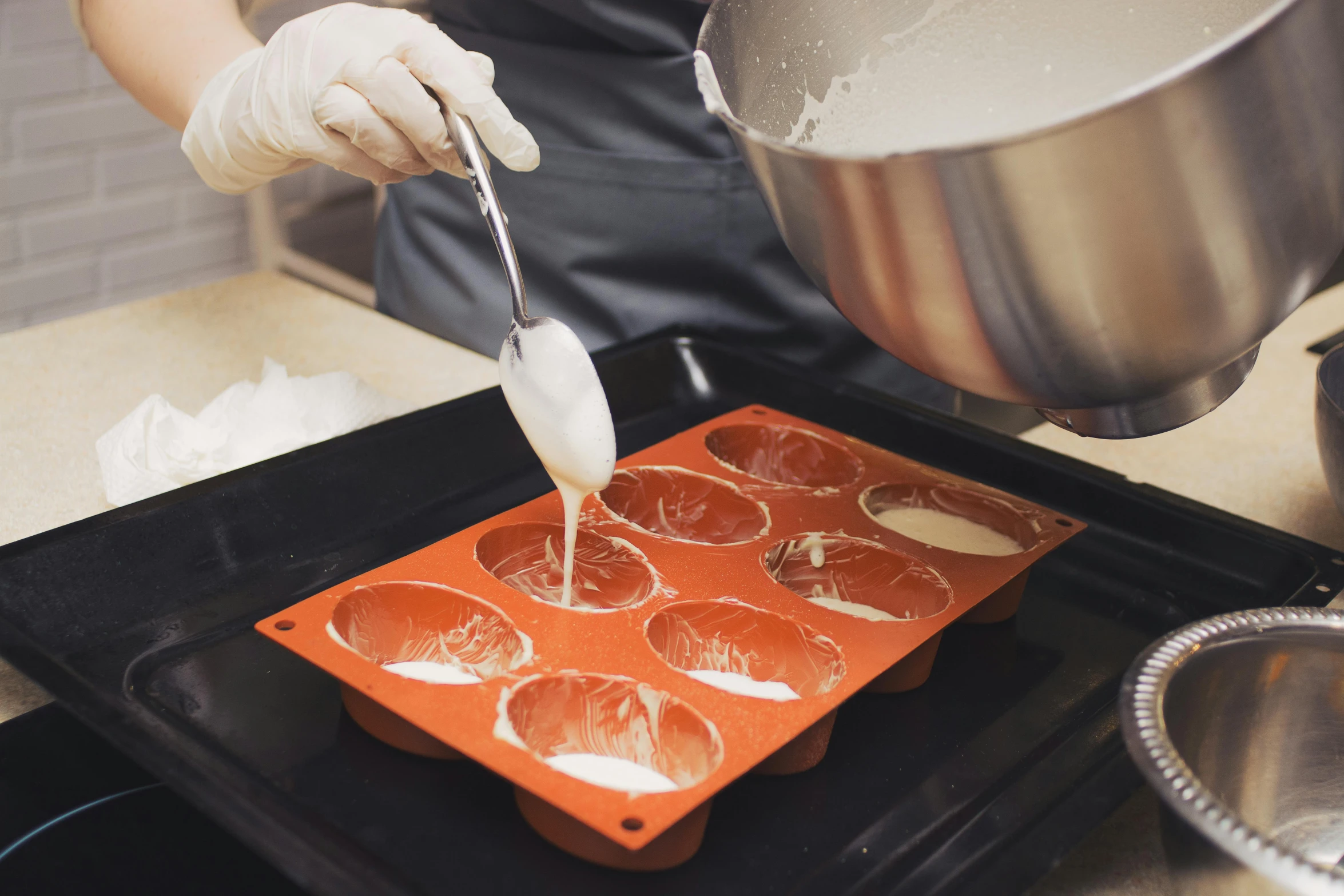 a person in a kitchen preparing food on a pan, carved soap, promo image, dessert, thumbnail