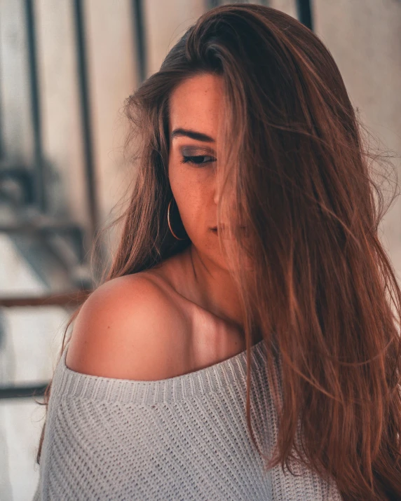 a close up of a woman with long hair, trending on unsplash, happening, outfit photo, desaturated color, wearing bra, hair : long brown