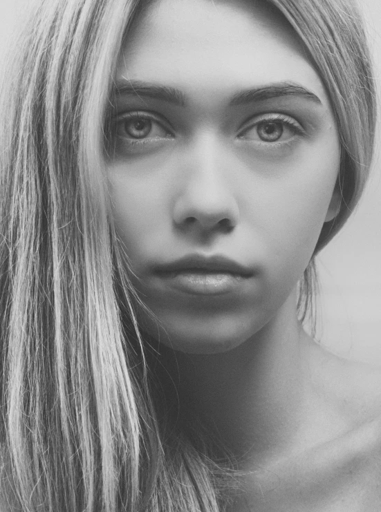 a black and white photo of a woman with long hair, inspired by irakli nadar, pexels contest winner, hyperrealism, imogen poots d&d paladin, madison beer girl portrait, color photograph portrait 4k, face morph