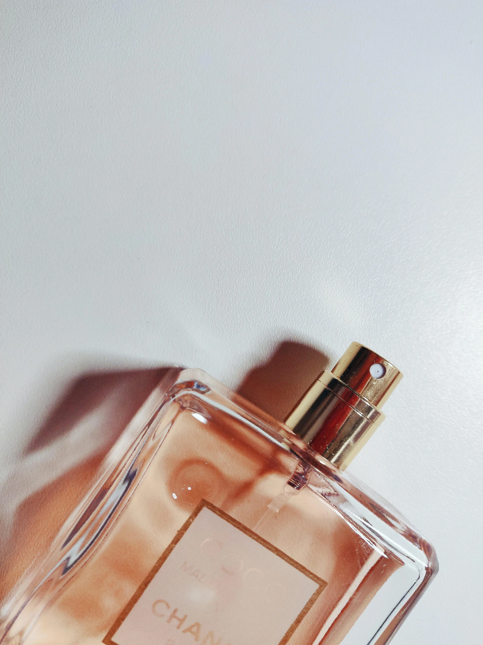 a close up of a bottle of perfume, unsplash, photorealism, 🎀 🧟 🍓 🧚, instagram story, isolate translucent, japanese