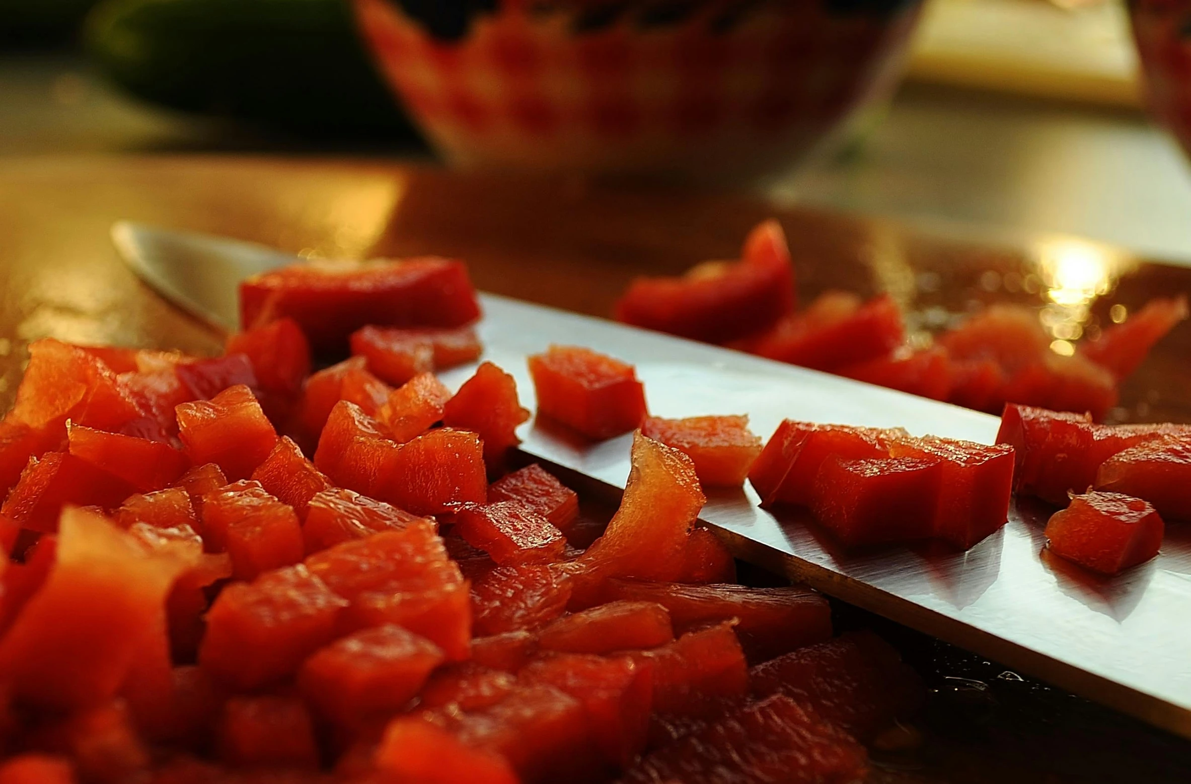 a knife sitting on top of a cutting board, pexels contest winner, hurufiyya, coral red, stew, thumbnail, background image