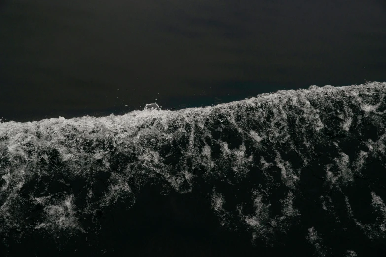 a man riding a wave on top of a surfboard, pexels contest winner, hurufiyya, on a black wall, unknown pleasures, sea foam, tooth wu : : quixel megascans