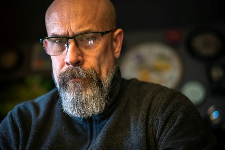 a man with a beard wearing glasses and a sweater, metabaron, profile image, documentary photo, avatar image