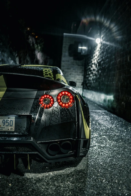 a black sports car parked on the side of a road, a picture, inspired by Elsa Bleda, pexels contest winner, ambient cave lighting, cobbled together nissan r34 gtr, in an underground parking garage, yellow lighting from right