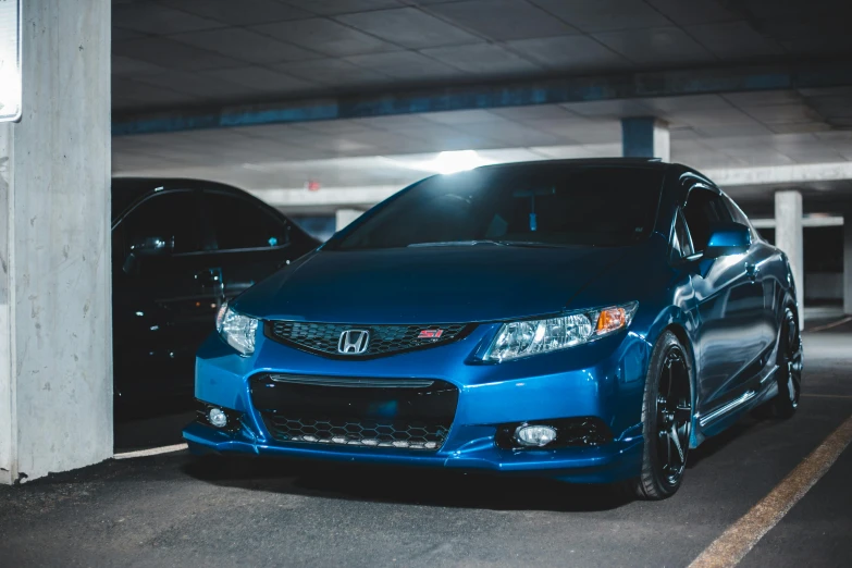 a blue car parked in a parking garage, inspired by Hiroshi Honda, unsplash, honda civic, long front end, avatar image, 2263539546]