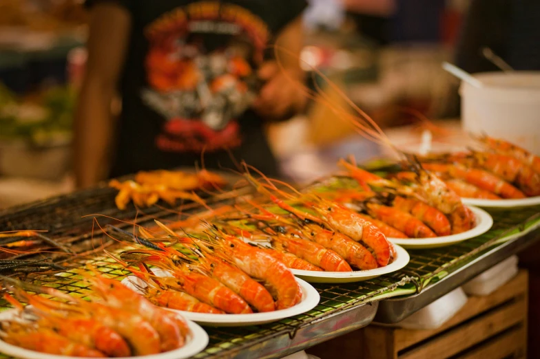 a number of plates of food on a table, by Joe Bowler, pexels contest winner, happening, prawn, bangkok, barbecue, background image