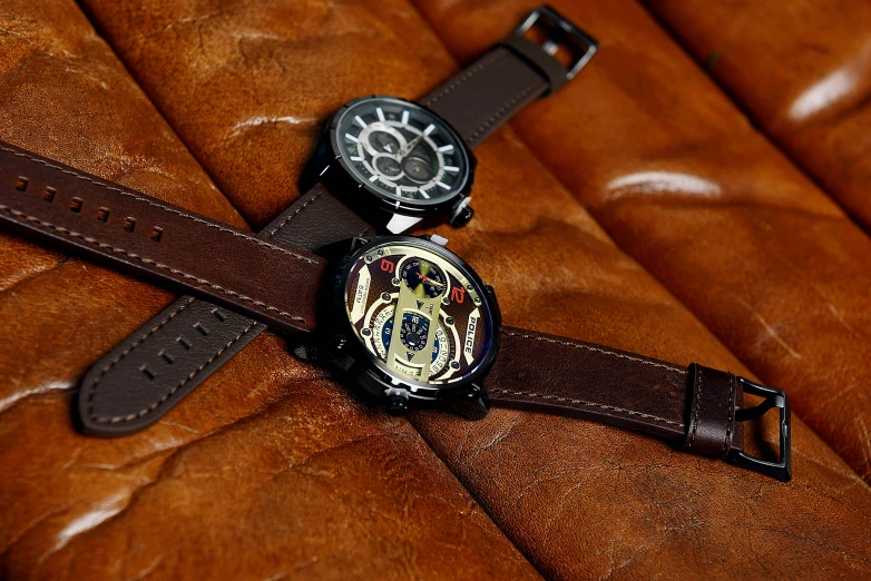 a close up of two watches on a leather surface, a portrait, by Julia Pishtar, art nouveau, shot on sony a 7, steampunk stormtrooper, various posed, thumbnail