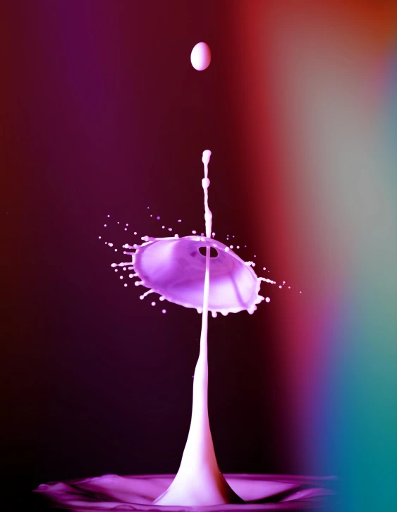 a close up of a liquid drop with a rainbow background, a raytraced image, by Doug Ohlson, purple scene lighting, spilled milk, promo image, octane - render