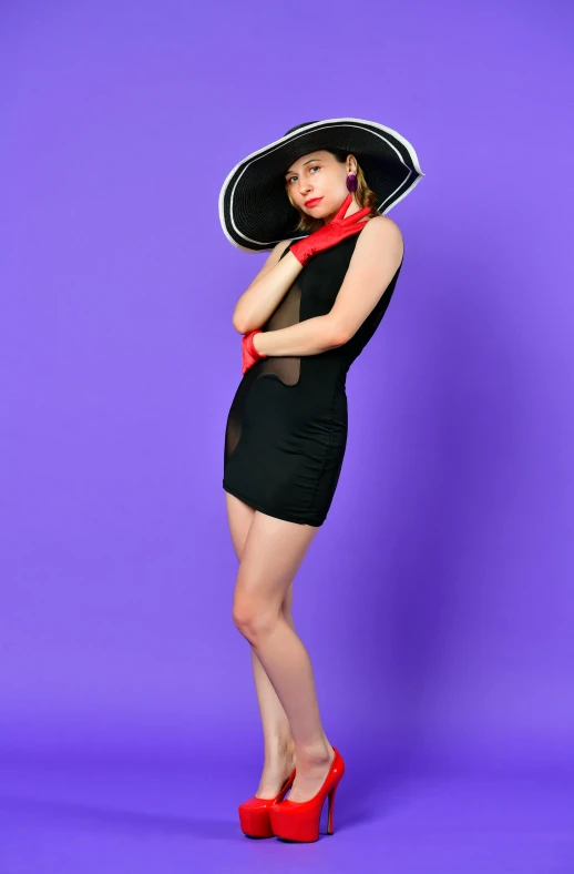 a woman in a black dress and a black hat, inspired by Tex Avery, high res photograph, purple and red, non binary model, 15081959 21121991 01012000 4k