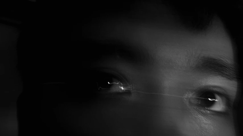 a black and white photo of a person's eyes, a black and white photo, by Jan Rustem, conceptual art, headlights, drifting, archival pigment print, an abstract
