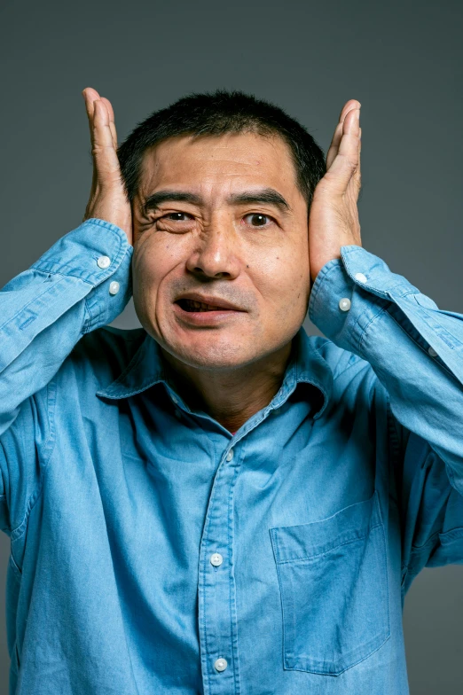 a man covering his eyes with his hands, an album cover, by Yan Liben, confused facial expression, portrait photo, ernie chan, middle aged man