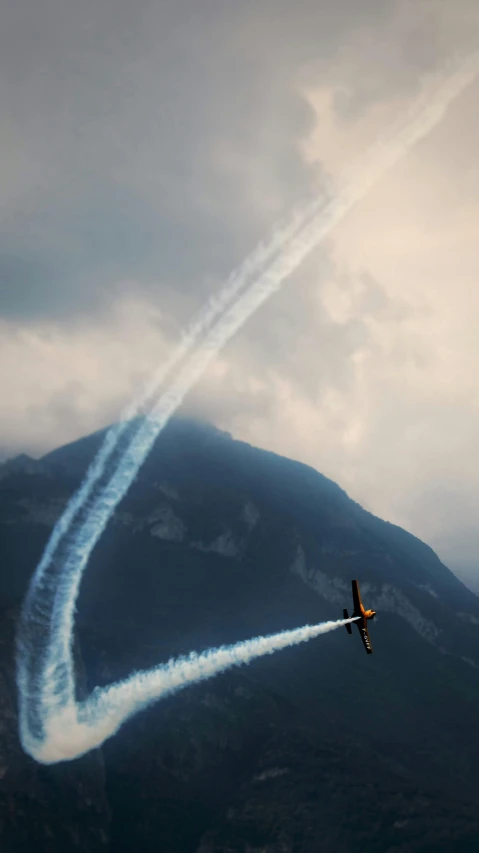 a couple of planes that are flying in the sky, by Tobias Stimmer, pexels contest winner, massive vertical grand prix race, alessio albi, thumbnail, switzerland