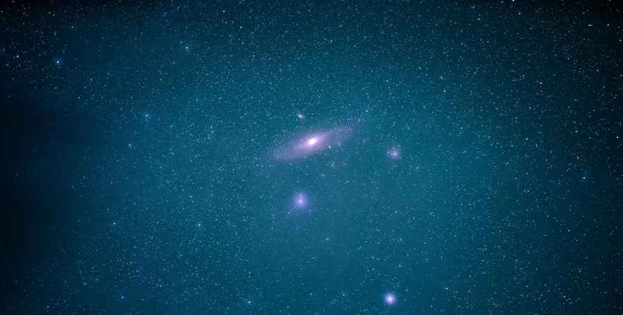 a group of stars that are in the sky, a microscopic photo, by Adam Marczyński, pexels, space art, andromeda, medium long shot, background artwork, taken in the early 2020s