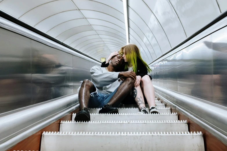 a man and a woman sitting on an escalator, by Carey Morris, pexels contest winner, making love, diverse, non binary model, idealised