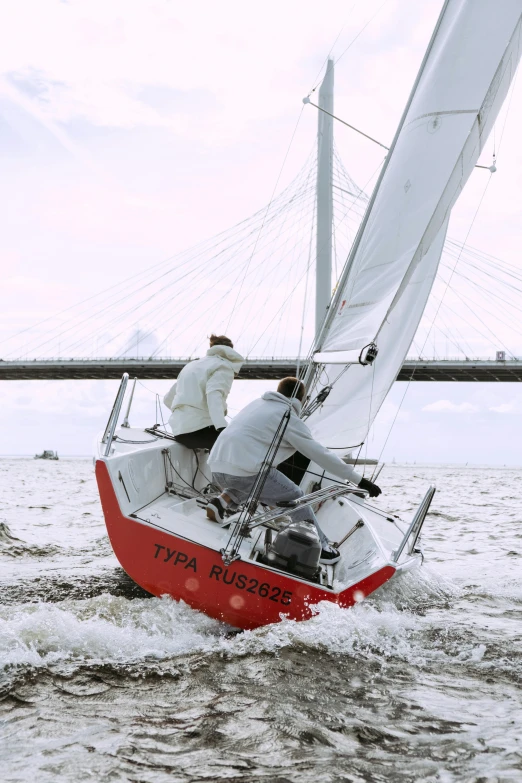 a couple of people on a sailboat in the water, happening, rough water, red river, profile image, type - 2