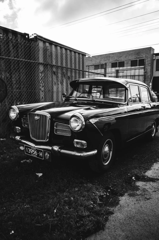 a black and white photo of an old car, a black and white photo, by Adam Pijnacker, square, high quality upload, nostalgic 8k, 1 9 6 2
